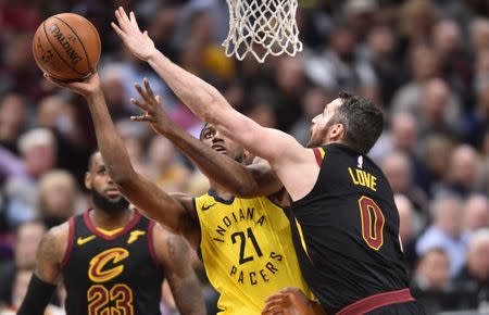 Apr 18, 2018; Cleveland, OH, USA; Indiana Pacers forward Thaddeus Young (21) drives to the basket against Cleveland Cavaliers center Kevin Love (0) during the second half in game two of the first round of the 2018 NBA Playoffs at Quicken Loans Arena. Mandatory Credit: Ken Blaze-USA TODAY Sports