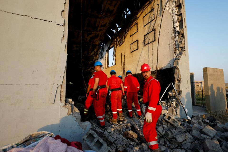 Officials work at the site following a fatal fire at a wedding celebration, in the district of Hamdaniya in Iraq’s Nineveh province, Iraq, 27 September 2023 (REUTERS)