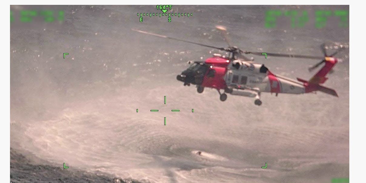 US Coastguard rescue struggling seamen in Gulf of Mexico