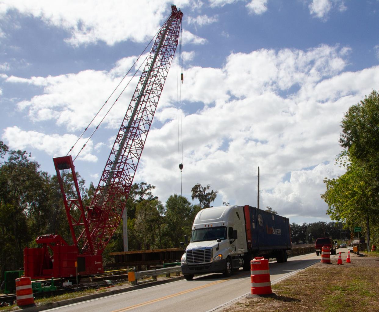 A crawler crane symbolized the first phase of construction on the replacement to the John Singletary Bridge in Fort Meade. The $19 million project is projected to finish in late 2025 or early 2026.