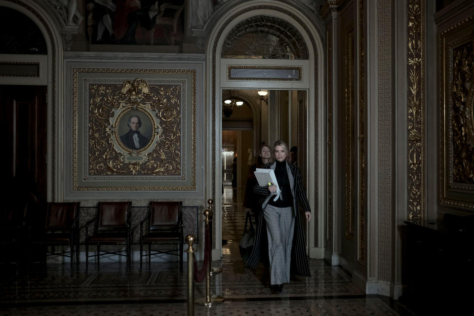 Pam Bondi, a lawyer on Trump's defense team, heads to the senate floor for the start of the impeachment trial at the Capitol in Washington, D.C., on Jan. 23, 2020. | Gabriella Demczuk for TIME