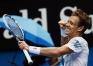 Tomas Berdych of the Czech Republic celebrates after defeating Rafael Nadal of Spain in their men's singles quarter-final match at the Australian Open 2015 tennis tournament in Melbourne January 27, 2015. REUTERS/Thomas Peter