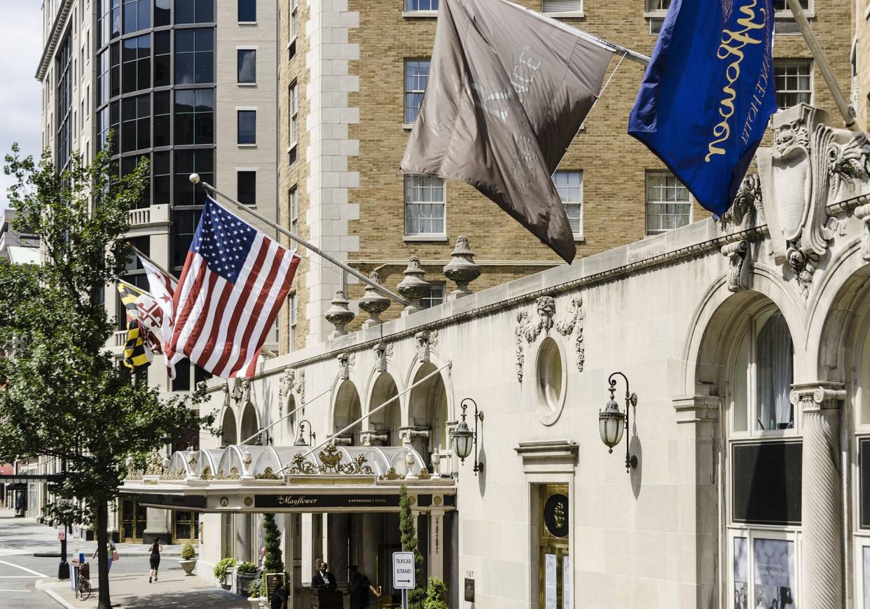 Washington DC, USA - June 4, 2012: People in front of the famous and upscale Mayflower Hotel in Washington DC.