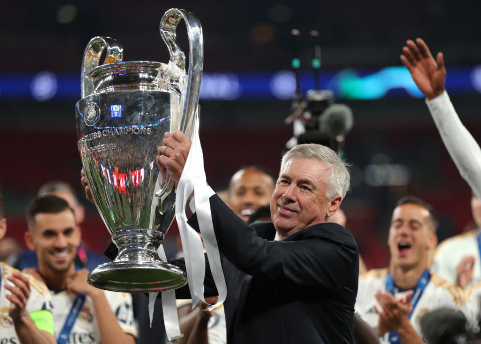 LONDON, ENGLAND - JUNE 01: Carlo Ancelotti, Head Coach of Real Madrid, lifts the UEFA Champions League Trophy after his team's victory during the UEFA Champions League 2023/24 Final match between Borussia Dortmund and Real Madrid CF at Wembley Stadium on June 01, 2024 in London, England. (Photo by Alex Pantling/Getty Images)