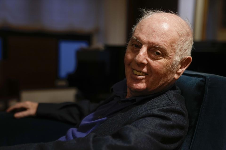 Argentine-born pianist and conductor Daniel Barenboim poses during an interview with The Associated Press, at La Scala theatre in Milan, Italy, Tuesday, Feb. 14, 2023. (AP Photo/Luca Bruno)