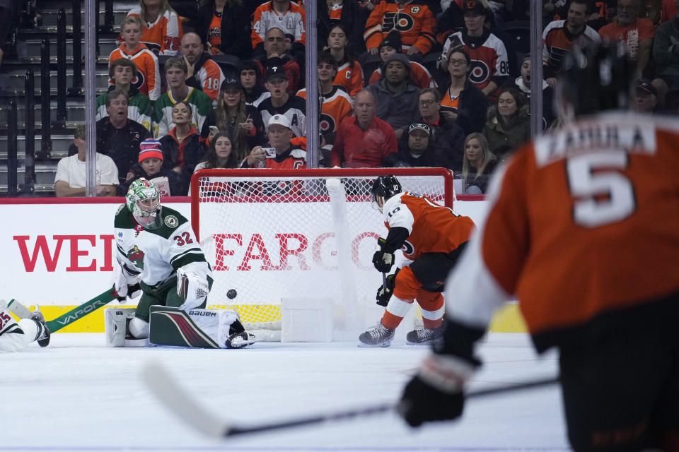 Philadelphia Flyers' Bobby Brink (10) scores a goal against Minnesota Wild's Filip Gustavsson (32) during the third period of an NHL hockey game, Thursday, Oct. 26, 2023, in Philadelphia. (AP Photo/Matt Slocum)