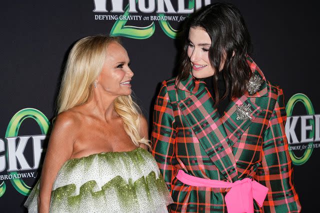 <p>John Nacion/Getty</p> Kristin Chenoweth and Idina Menzel attend the 'Wicked' 20th anniversary performance in New York City.