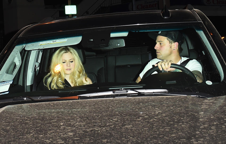 Avril Lavigne and Ryan Cabrera leave Craig’s restaurant in West Hollywood on Feb. 6. (Photo: SAF/Splash News)