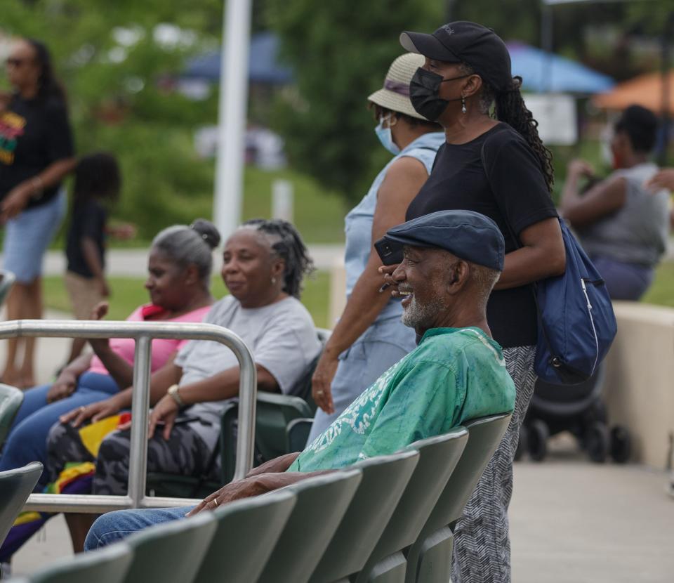 People gather at the amphitheater at Cascades Park to watch various performances during Juneteenth Empowerment Day Saturday, June 19, 2021.