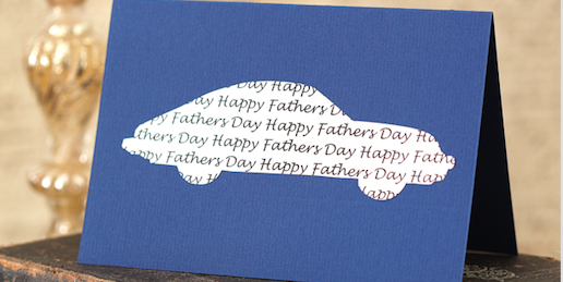 blue father's day card with a car on an old book