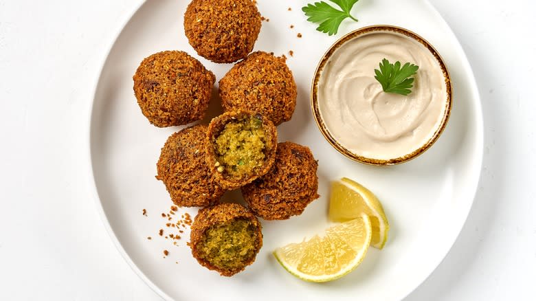 hummus and falafels on plate