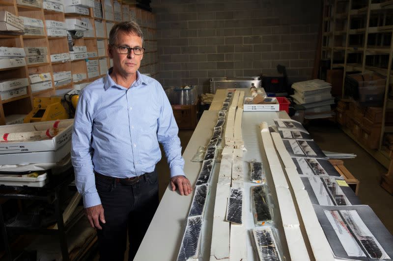 Braddock Linsley poses with a coral core recovered during a research trip in American Samoa in 2011 inside of the Lamont-Doherty Earth Observatory of Columbia University in Palisades, New York