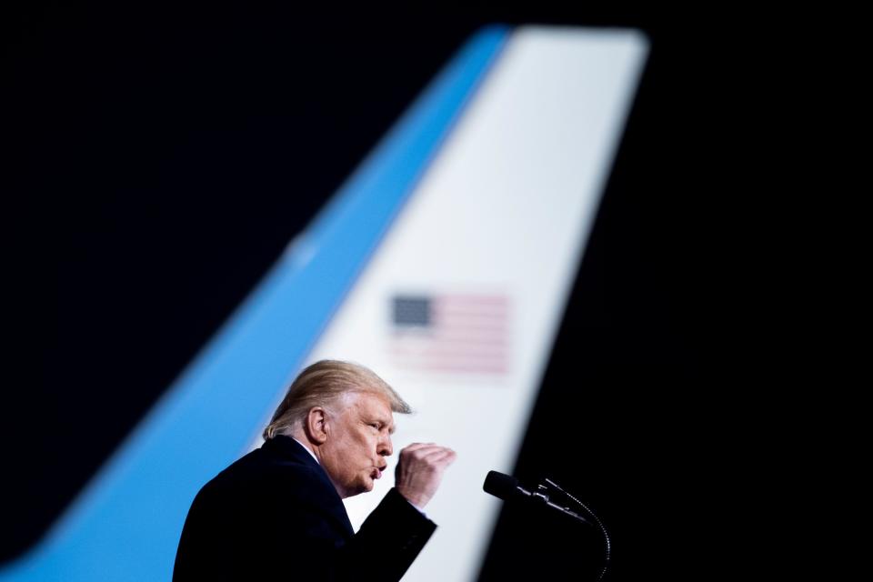 President Donald Trump gestures as he speaks during a campaign rally at Bemidji Regional Airport in Bemidji, Minnesota, on Sept. 18, 2020.