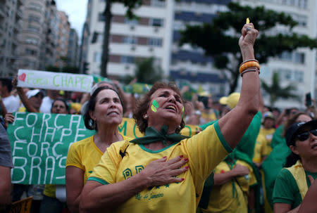 A demonstrator yells slogans during a protest against corruption at the Copacabana beach in Rio de Janeiro, Brazil, December 4, 2016. REUTERS/Pilar Olivares