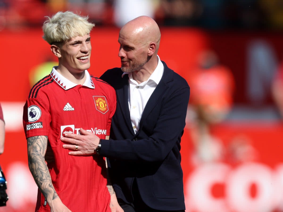 Ten Hag shares a joke with Alejandro Garnacho after the win at Old Trafford (Getty)