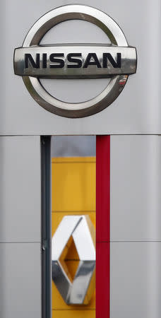 FILE PHOTO: The logos of car manufacturers Renault and Nissan are seen in front of a common dealership of the companies in Saint-Avold, France, January 15, 2019. REUTERS/Christian Hartmann/File Photo