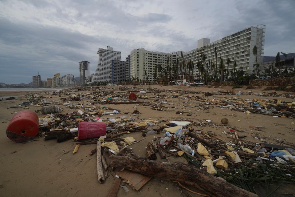Debris on the beach in Acapulco, Mexio on Thursday after Hurricane Otis (AP)