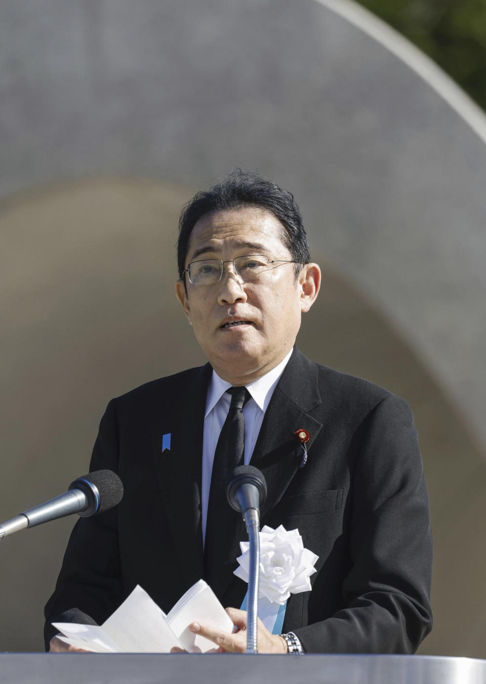 Japan's Prime Minister Fumio Kishida delivers a speech during a ceremony marking the 78th anniversary of the world's first atomic bombing at the Hiroshima Peace Memorial Park in Hiroshima, western Japan Sunday, Aug. 6, 2023. (Kyodo News via AP)