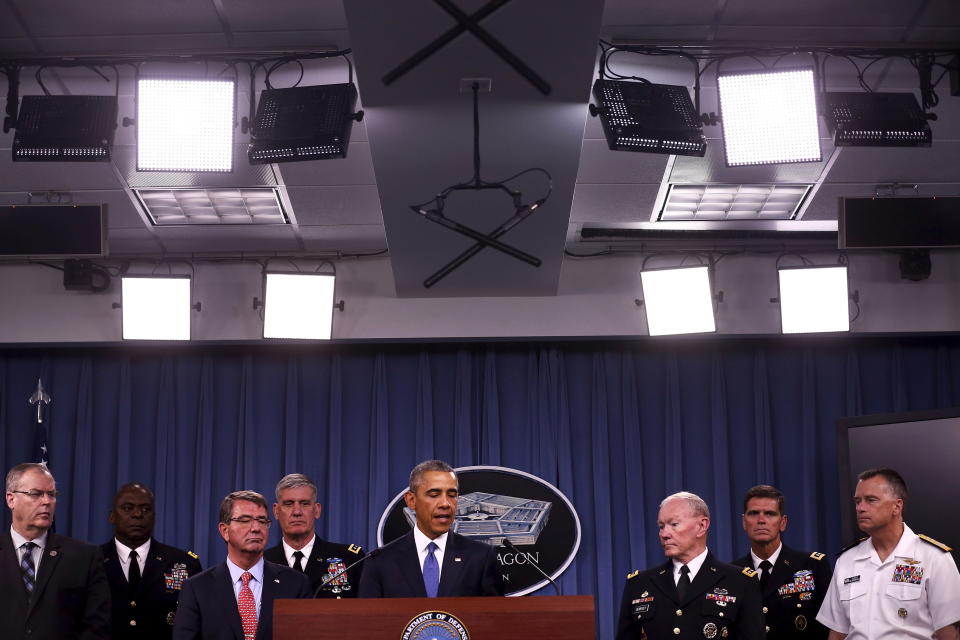 President Barack Obama briefs reporters on U.S. efforts against the self-described Islamic State. Obama expanded the 2001 authorization to apply to the U.S. battle against ISIS. (Photo: Jonathan Ernst / Reuters)