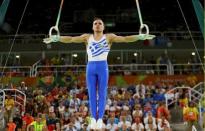 2016 Rio Olympics - Artistic Gymnastics - Final - Men's Rings Final - Rio Olympic Arena - Rio de Janeiro, Brazil - 15/08/2016. Eleftherios Petrounias (GRE) of Greece competes. REUTERS/Mike Blake