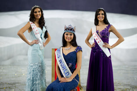 China's Wenxia with first runner-up Sophie Elizabeth Moulds of Wales and second runner-up is Jessica Michelle Kahawaty of Australia. (Ed Jones/AFP/Getty)