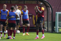 Roma's Tammy Abraham, right, trains with his teammates during a media day ahead of the Europa League soccer final, at the Trigoria training centre, in Rome, Thursday, May 25, 2023. Roma will play an Europa League final against Sevilla in Budapest, Hungary, next Wednesday, May 31. (AP Photo/Andrew Medichini)