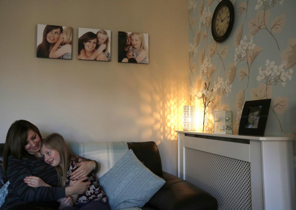 Claire Coyne poses with her daughter Ella at their home in Shepshed