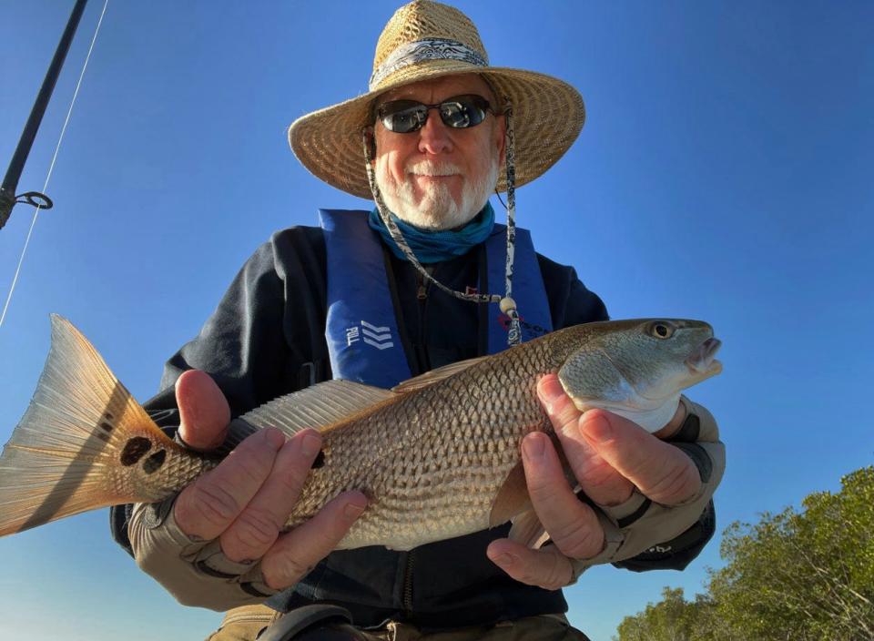 Chris Williams of Lakeland caught this keeper size multi spot redfish on a live shrimp while fishing the Peace River near Punta Gorda recently. 