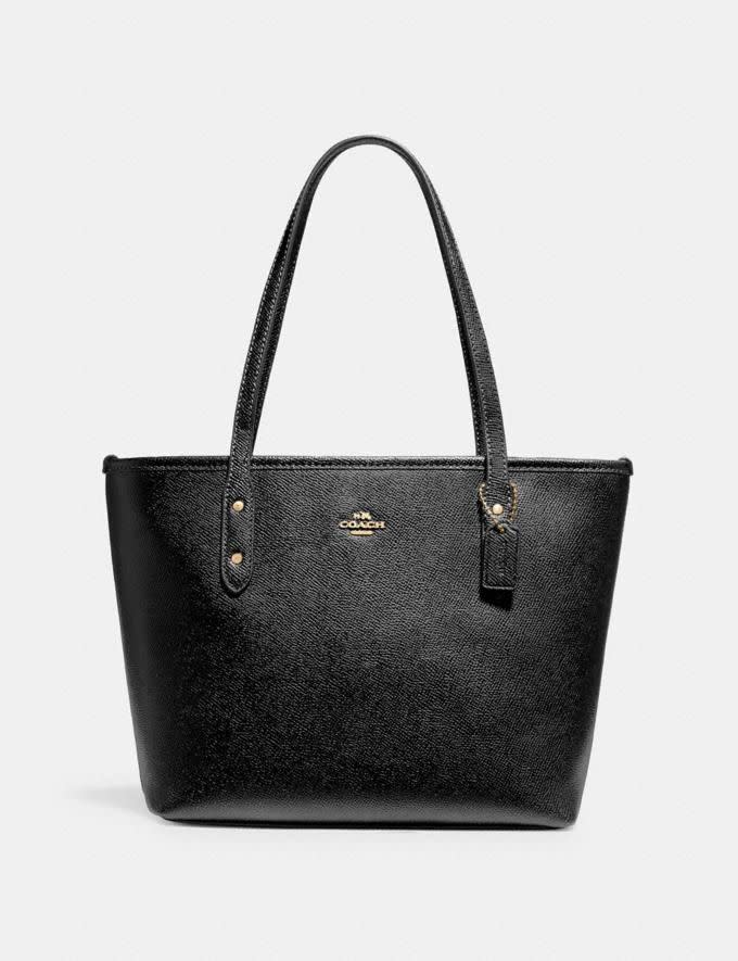 Bolso Mini City negro con cremallera (Imagen a través de Coach)