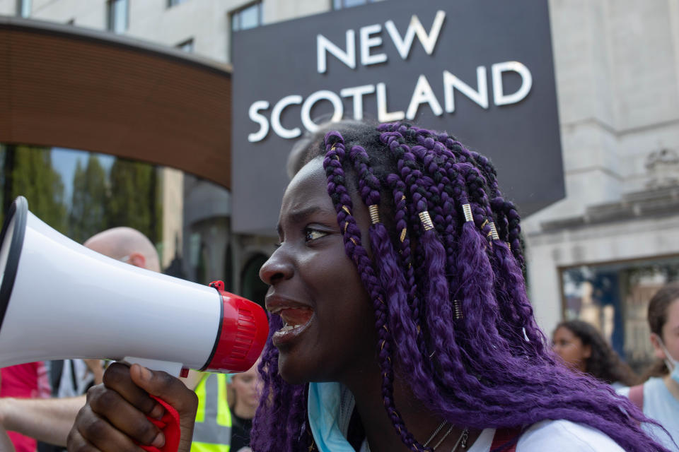  A demonstrator shouts slogans on a megaphone during a Black lives Matter protest outside Scotland Yard.
The protesters are calling for an end to �over policing of Black communities� and the use of excessive force. (Photo by Thabo Jaiyesimi / SOPA Images/Sipa USA) 