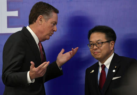 US Trade Representative Robert Lighthizer (L) talks to Japan's Minister of Trade and Industry Hiroshige Seko prior to a joint press conference held on the sideline of the Asia-Pacific Economic Cooperation ( APEC)'s 23rd Ministers responsible for Trade Meeting being held in Hanoi, Vietnam May 21, 2017. REUTERS/Pool