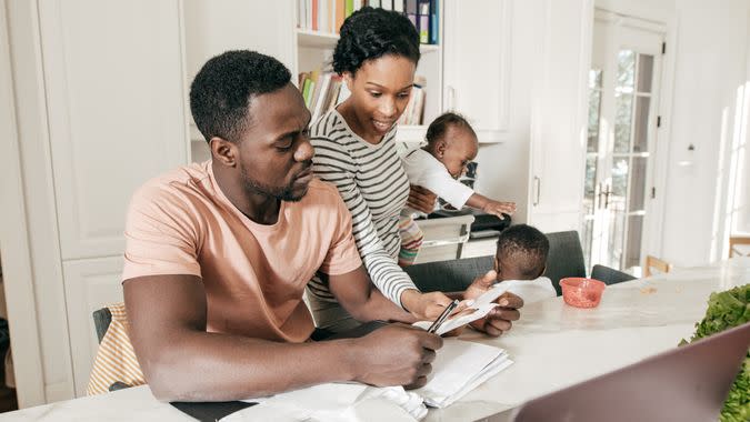 african american couple budgeting together in their house