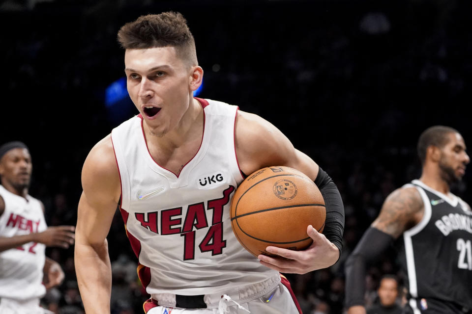 Miami Heat guard Tyler Herro reacts after drawing a foul during the first half of an NBA basketball game against the Brooklyn Nets, Wednesday, Oct. 27, 2021, in New York. (AP Photo/John Minchillo)