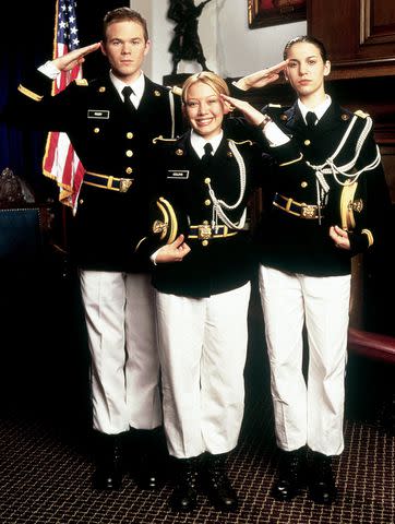<p>Cinematic/Alamy</p> Shawn Ashmore, Hilary Duff and Christy Carlson Romano in 2002's 'Cadet Kelly'