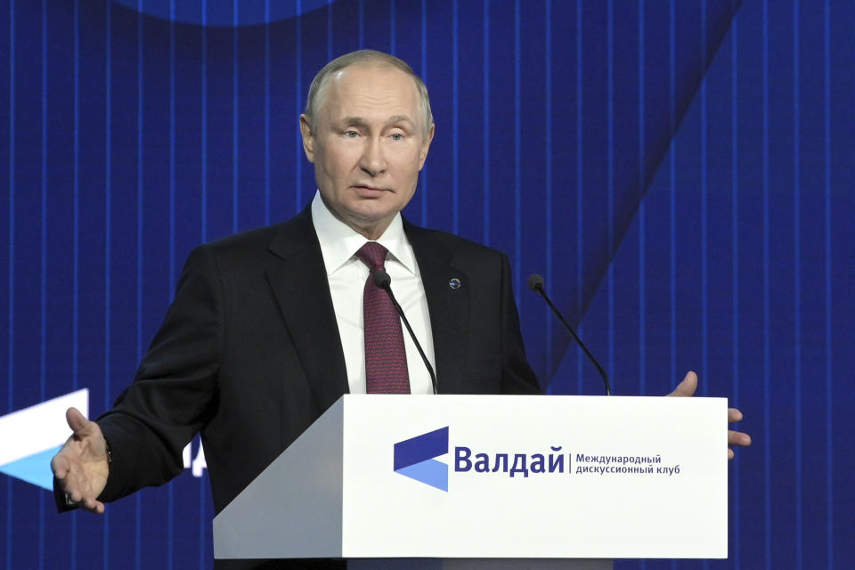 Russian President Vladimir Putin gestures as he speaks at the plenary session of the 19th annual meeting of the Valdai International Discussion Club outside Moscow, Russia, Thursday, Oct. 27, 2022. (Sergei Karpukhin, Sputnik, Kremlin Pool Photo via AP)