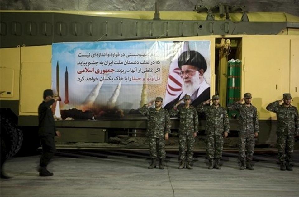 Members of Iran’s Islamic Revolutionary Guard Corps (IRGC) Aerospace Force salute at an underground missile base. REUTERS/farsnews.com/Handout via Reuters