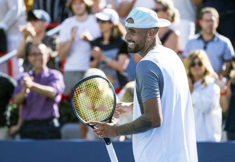 Nick Kyrgios of Australia celebrates his victory over Daniil Medvedev during second round play at the National Bank Open tennis tournament Wednesday Aug. 10, 2022. in Montreal. (Paul Chiasson/The Canadian Press via AP)