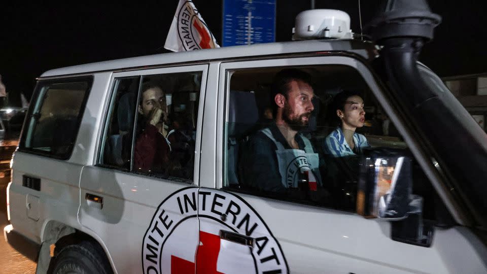 A vehicle of the ICRC drives hostages to the Rafah border point with Egypt as part of a transfer deal on November 26, 2023. - Mohammed Abed/AFP/Getty Images