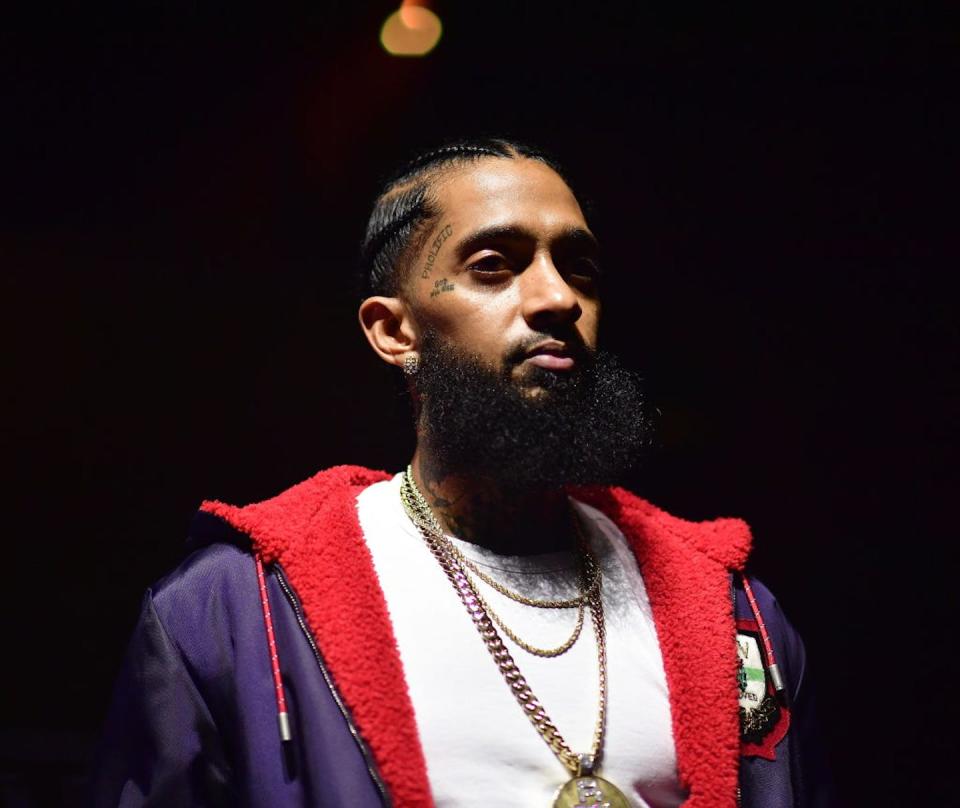 Rap star <span class="caas-xray-inline-tooltip"><span class="caas-xray-inline caas-xray-entity caas-xray-pill rapid-nonanchor-lt" data-entity-id="Nipsey_Hussle" data-ylk="cid:Nipsey_Hussle;pos:4;elmt:wiki;sec:pill-inline-entity;elm:pill-inline-text;itc:1;cat:Musician;" tabindex="0" aria-haspopup="dialog"><a href="https://search.yahoo.com/search?p=Nipsey%20Hussle" data-i13n="cid:Nipsey_Hussle;pos:4;elmt:wiki;sec:pill-inline-entity;elm:pill-inline-text;itc:1;cat:Musician;" tabindex="-1" data-ylk="slk:Nipsey Hussle;cid:Nipsey_Hussle;pos:4;elmt:wiki;sec:pill-inline-entity;elm:pill-inline-text;itc:1;cat:Musician;" class="link ">Nipsey Hussle</a></span></span> was shot and killed in Los Angeles in 2019. <a href="https://www.gettyimages.com/detail/news-photo/rapper-nipsey-hussle-attends-a-craft-syndicate-music-news-photo/1080924940?adppopup=true" rel="nofollow noopener" target="_blank" data-ylk="slk:Prince Williams/WireImage via Getty Images;elm:context_link;itc:0;sec:content-canvas" class="link ">Prince Williams/WireImage via Getty Images</a>