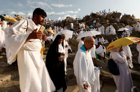 Muslim pilgrims gather on Mount Mercy on the plains of Arafat during the annual haj pilgrimage, outside the holy city of Mecca, Saudi Arabia August 20, 2018. REUTERS/Zohra Bensemra