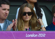 The girlfriend of Great Britain's Andy Murray, Kim Sears, watches as he plays the men's singles gold medal match of the London 2012 Olympic Games against Switzerland's Roger Federer, at the All England Tennis Club in Wimbledon, southwest London, on August 5, 2012. AFP PHOTO / LUIS ACOSTALUIS ACOSTA/AFP/GettyImages