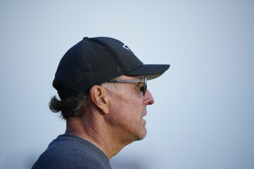 United States' Phil Mickelson waits to play on the 17th tee on the first day of the British Open Golf Championships at the Royal Liverpool Golf Club in Hoylake, England, Thursday, July 20, 2023. (AP Photo/Jon Super)