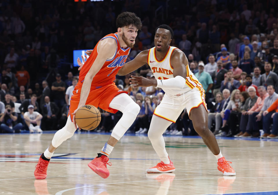 Nov 6, 2023; Oklahoma City, Oklahoma, USA; Oklahoma City Thunder forward Chet Holmgren (7) drives against Atlanta Hawks forward Onyeka Okongwu (17) during the second half at Paycom Center. Oklahoma City won 126-117. Mandatory Credit: Alonzo Adams-USA TODAY Sports