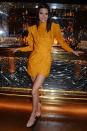 <p>Jenner wore a Dundas yellow wrap dress to the party in London, November 2018.</p>