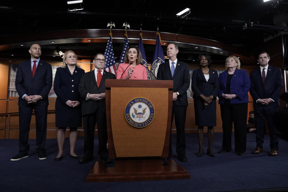 Speaker of the House Nancy Pelosi, D-Calif., meets with reporters to announce the House impeachment managers as she prepares to send articles of impeachment to the Senate against President Donald Trump for abuse of power and obstruction of Congress, at the Capitol in Washington, Wednesday, Jan. 15, 2020. With Pelosi from left are Rep. Hakeem Jeffries, D-N.Y., Rep. Sylvia Garcia, D-Texas, House Judiciary Committee, Rep. Jerrold Nadler, D-N.Y., Pelosi, House Intelligence Committee Chairman Adam Schiff, D-Calif., Rep. Val Demings, D-Fla., Rep. Zoe Lofgren, D-Calif. and Rep. Jason Crow, D-Colo. (Photo: J. Scott Applewhite/AP)  