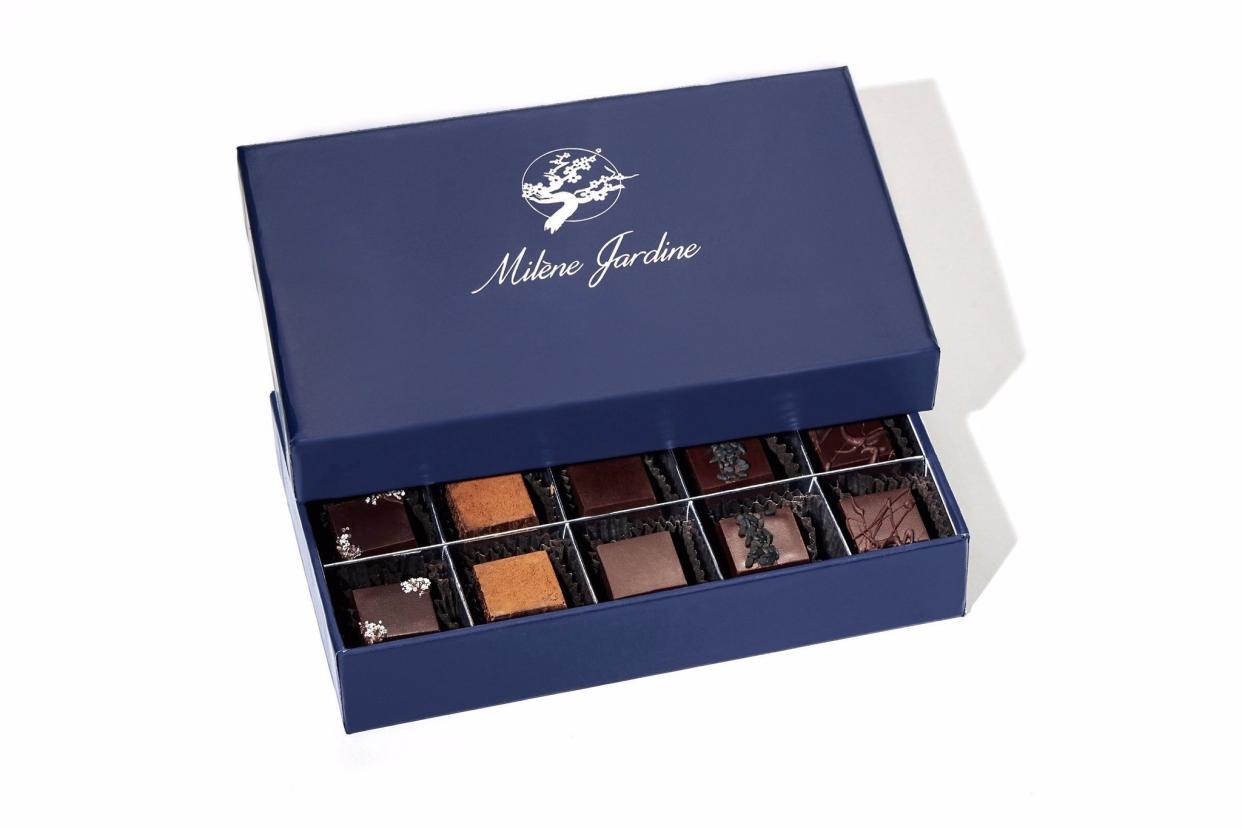 <p><a href="https://milenejardine.com/products/chocolate-truffle-gift-box-15pc" rel="nofollow noopener" target="_blank" data-ylk="slk:Shop Now;elm:context_link;itc:0;sec:content-canvas" class="link rapid-noclick-resp">Shop Now</a></p><p>"Live by Love" Chocolate Truffle Gift Box, 15 Pieces</p><p>milenejardine.com</p><p>$45.00</p>