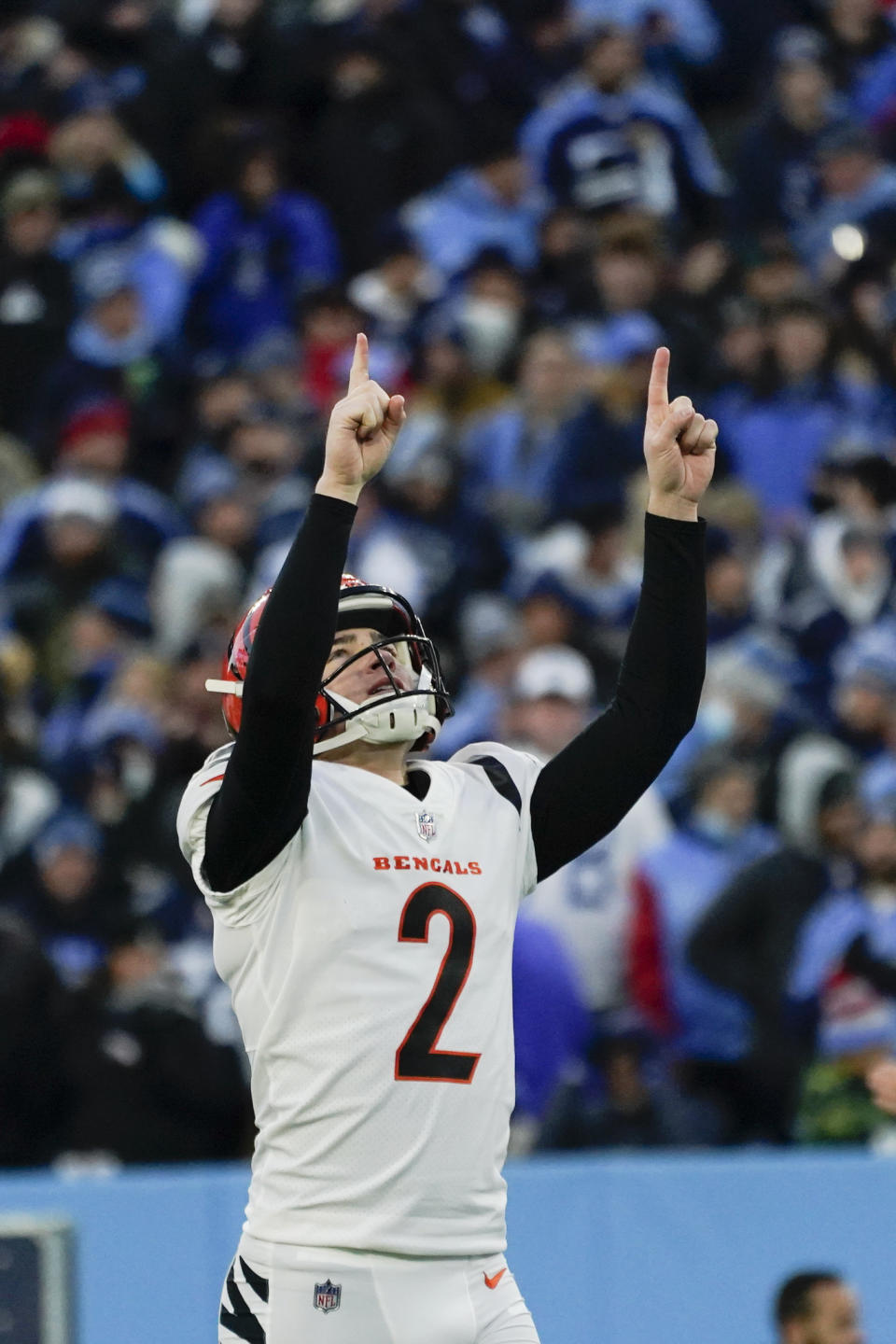 Cincinnati Bengals kicker Evan McPherson (2) celebrates his 54-yard field goal against the Tennessee Titans during the first half of an NFL divisional round playoff football game, Saturday, Jan. 22, 2022, in Nashville, Tenn. (AP Photo/Mark Humphrey)