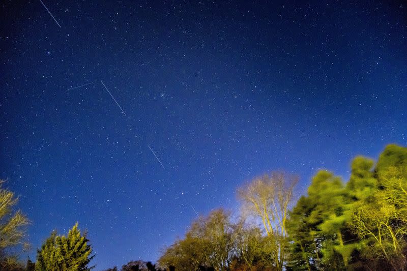 SpaceX Starlink 5 satellites are pictured in the sky seen from Svendborg