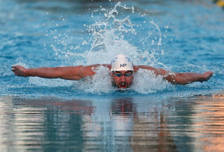 Michael Phelps competes in the 100m butterfly final at the Arena Pro Swim Series on April 16, 2015 in Mesa, Arizona
