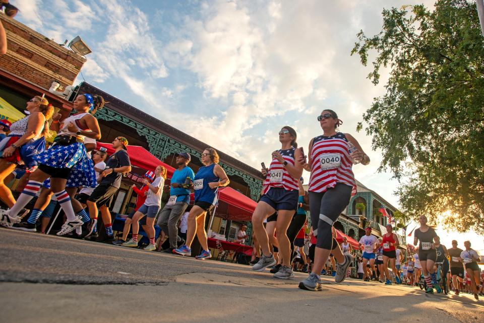 Runners break from the starting line during last year's Ronald McDonald House Charities of Northwest Florida Firecracker 5K.